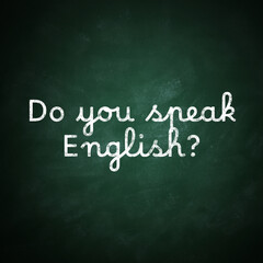 Obraz premium Do You Speak English? text on green chalkboard. Language course