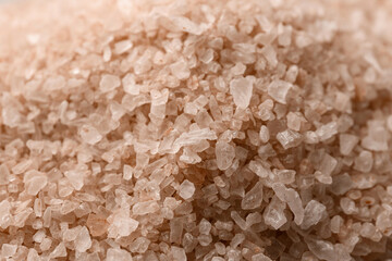 Sea salt in shade of mocha mousse, closeup. Color of 2025 year