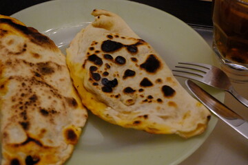 Homemade pancake. Close-up view of Turkish culinary delicacy raw pastry on plate. Traditional Turkish cuisine.
