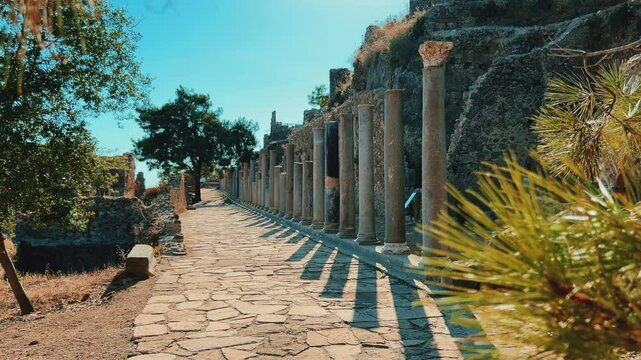Ruins of the ancient Roman port city of Siedra in Alanya, Antalya, Turkey. The street and ruins of the ancient abandoned ancient city of Siedra on the Mediterranean coast. 4К