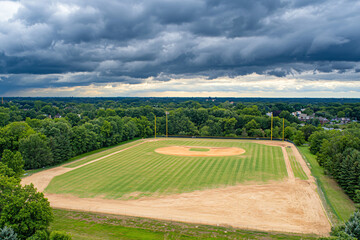 drone view baseball field under overcast sky