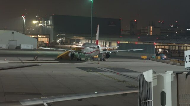 Vienna, Austria - January 19, 2025: Aircraft before departure. Airport night operations.
