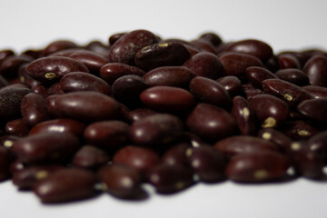 Close-up side take of freshly harvested black beans.Healthy food. Seasonal legumes. Organic food concept 
