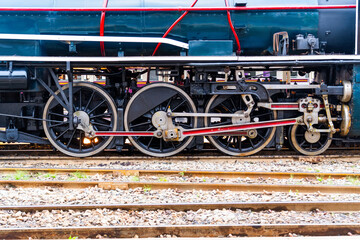 Wheels of an old retro steam train locomotive t rail ways