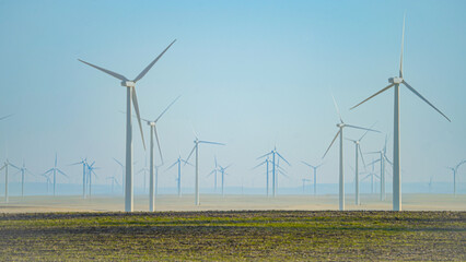 Windmills in an open field