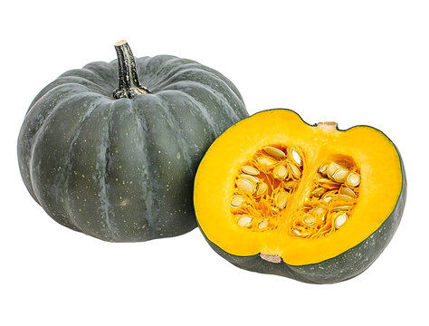 Pumpkin with green skin and yellow seeds cut in half and isolated on a white background Real photograph