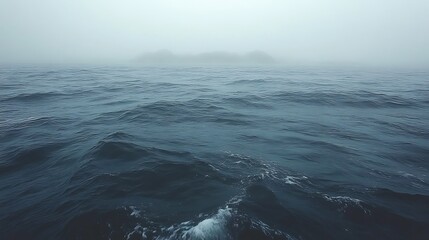 Fototapeta premium Misty Ocean Scene With Distant Islands