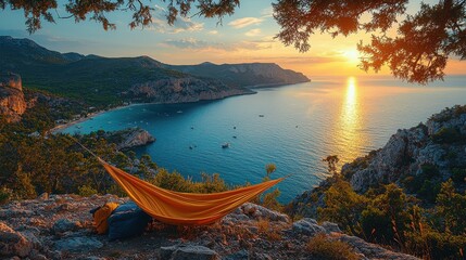 Serenity at sunset near a coastal hammock overlooking calm waters and distant cliffs in a picturesque bay