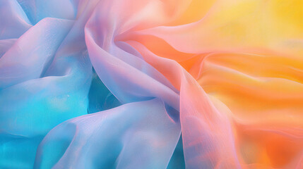 Obraz premium Soft pastel fabric with silky texture, blending vibrant blue, orange, and yellow hues in flowing, ethereal design