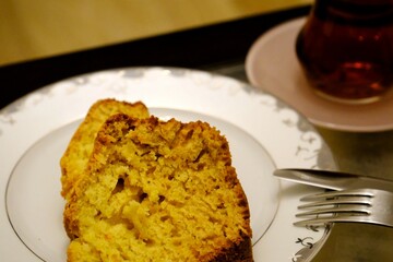 Homemade orange cake close-up. Practical cake recipe. Pastries. Healthy diet.