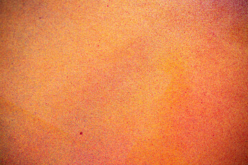 スプレー塗料のオレンジ色の背景