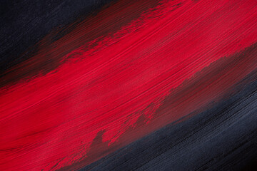 赤色と黒色の絵具で塗った背景