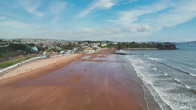 Steam Train over Goodrington Beach from a drone, Paignton, Kingswear, Devon, England