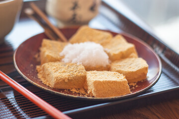 Close up of a plate of warabimochi - Japanese confectionery. Kyoto, Japan