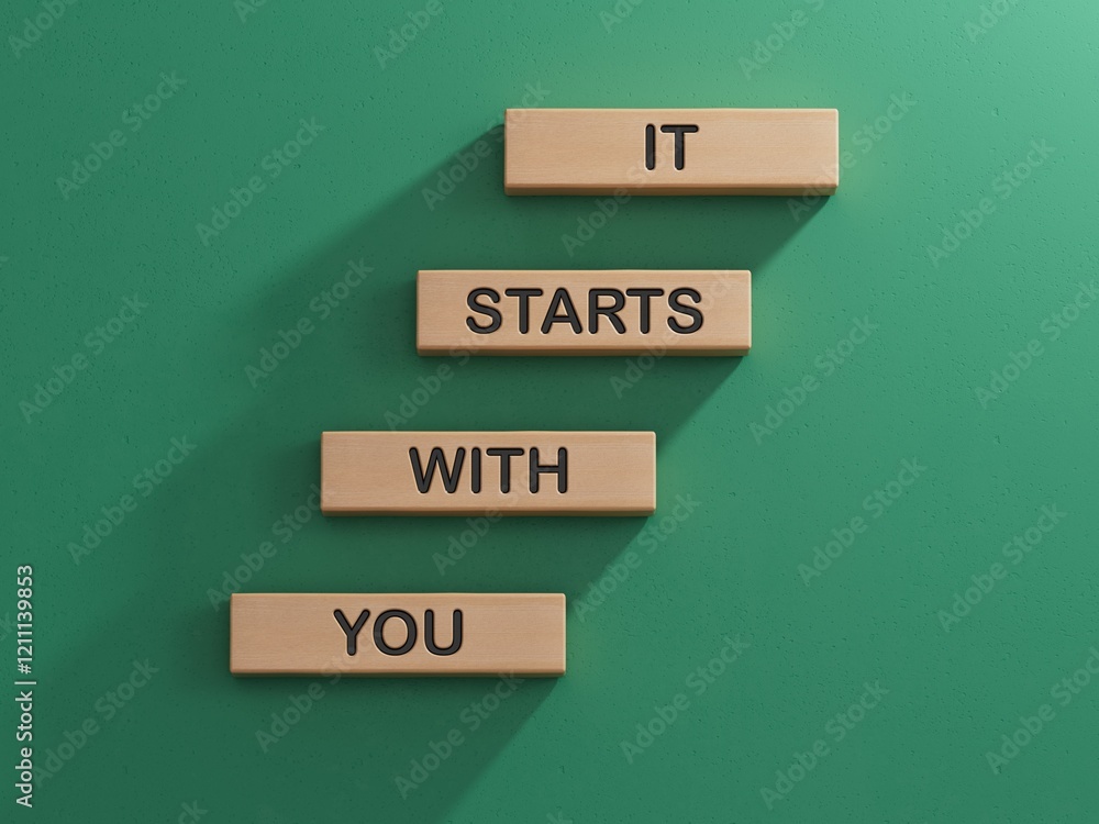 Poster It starts with you symbol. Wooden blocks with words It starts with you.Business and It starts with you concept. Copy space.3D rendering on green background.