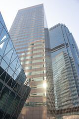 Skyward view of modern office buildings in Hong Kong