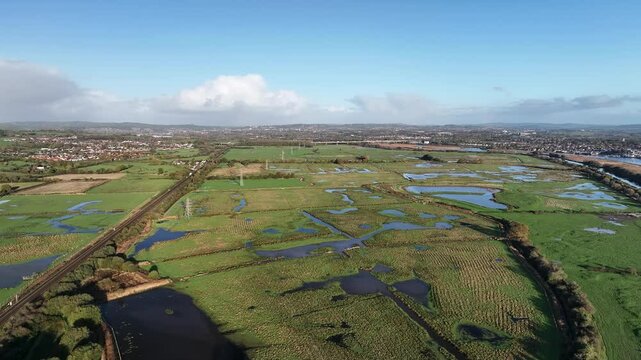 Wetlands and Marshes in RSPB Exminster and Powderham Marshe from a drone, Exeter, Devon, England