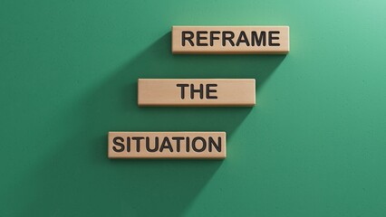 Reframe the situation symbol. Concept words Reframe the situation on wooden blocks. Business concept. Wooden cube blocks. Copy space.3D rendering on green background.