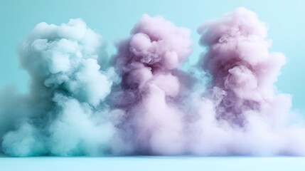 Pastel Colored Smoke Clouds Against a Light Blue Background