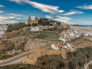 Aerial view of Antequera, mediaval Spanish town with huge castle and city walls in Andalusia Spain