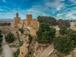 Aerial view of Antequera Moorish fortress with rectangular keep, city walls in Andalusia Spain