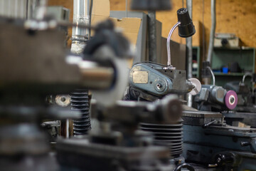 A big industrial precision cutting machine in a warehouse.