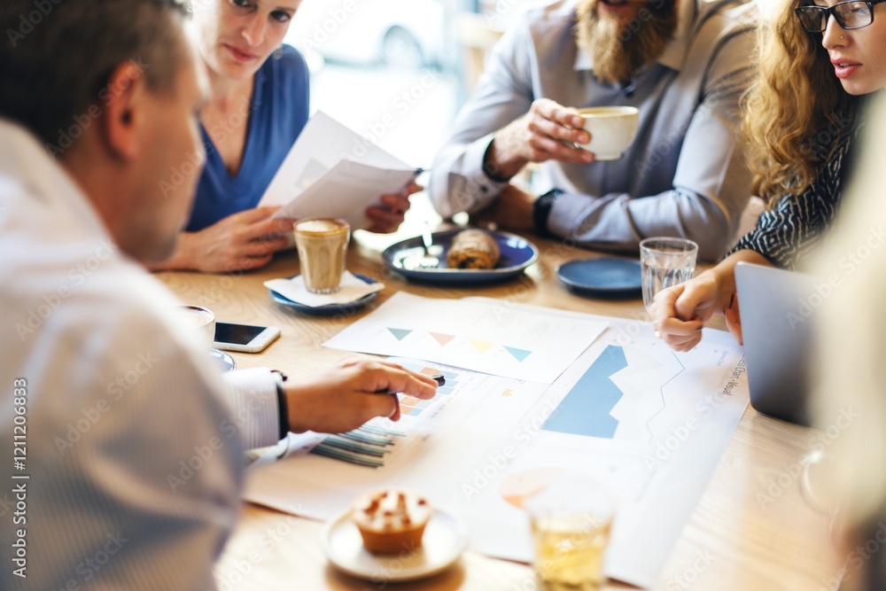Poster Group meeting with diverse people discussing charts and graphs. Teamwork at a table discussion with graphs. Collaboration and analysis focus. Business meeting. Business discussion with diverse people