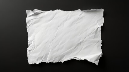 Obraz premium Torn white paper on black background