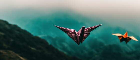 Serene Origami Birds Soaring Over Misty Mountains