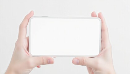 Hands Holding a Blank Smartphone Against a Light Background