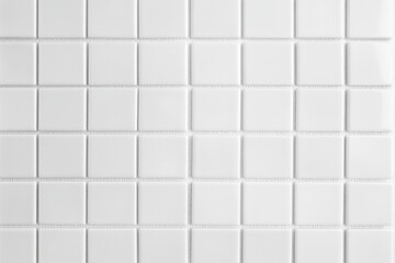 A seamless pattern of small white tiles arranged in a grid, creating a clean and minimalist aesthetic.