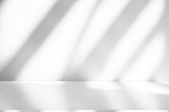 Wall interior background, studio and backdrops show products.with shadow from window color white and grey. background for text insertion and presentation product	