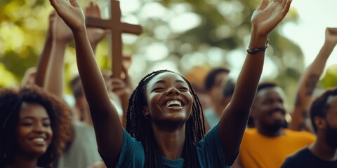 Fototapeta premium A cheerful photo of worshippers raising a cross during an outdoor revival, with hands lifted in praise
