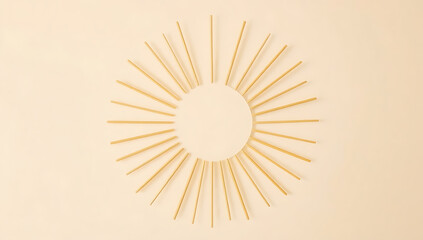A simple sunburst frame with clean, straight lines radiating outward in a golden yellow hue, set against a solid pastel background.