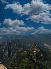 Great Wall Spanning Mountain Peaks Under Vibrant Sky