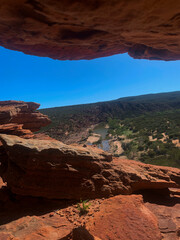 Rock Formation Framing Scenic River Valley View
