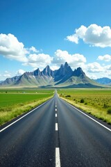 Fototapeta premium Asphalt ribbon unwinding towards majestic peaks under a vibrant sky, a scenic drive through verdant fields and rolling hills