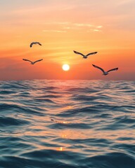 Obraz premium A serene photo of seagulls flying over the water as the sun dips below the horizon, creating peaceful reflections