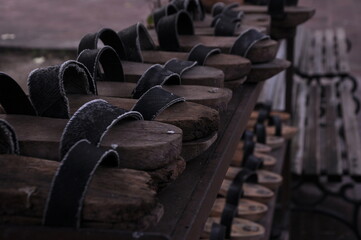 Obraz premium Wooden ablution clogs found in the shoe rack in the Sultan Mosque courtyard