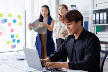 Brainstorming Collaboration and  successful partnership analysis by Team of Young business Asian people working in an office workspace