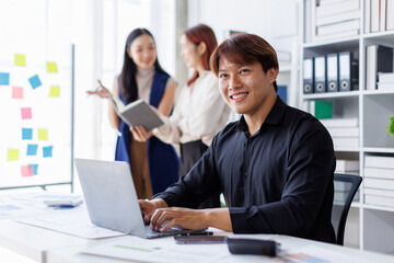 Brainstorming Collaboration and  successful partnership analysis by Team of Young business Asian people working in an office workspace