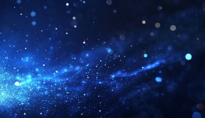 Fototapeta premium Abstract blue glowing particle background.