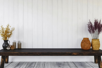 Rustic wooden table decorated with vases and jars on a light wooden background