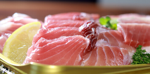 A close-up shot of cold tuna sashimi. Fresh seafood dishes.
