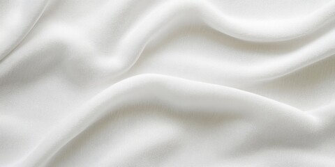 Obraz premium Smooth white fabric texture on a snowy canvas background with gentle folds and soft curves, creating a serene winter atmosphere.