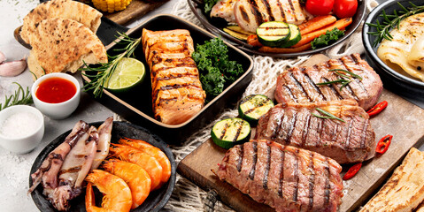Grilled fish, seafood and meat assortment