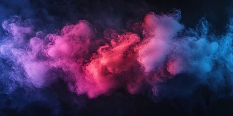Colorful smoke cloud swirling in shades of pink, red, and blue against a dark background creating a dynamic abstract atmosphere.