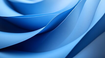 A close-up of blue paper showing the smooth curve background