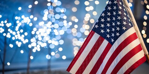 Fototapeta premium Patriotic United States Flag with Beautiful Glittering Blue Light Background 