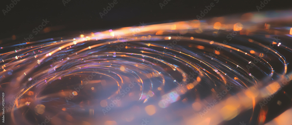 Poster Wires intertwining in light tunnels convey a journey through acceleration and speed